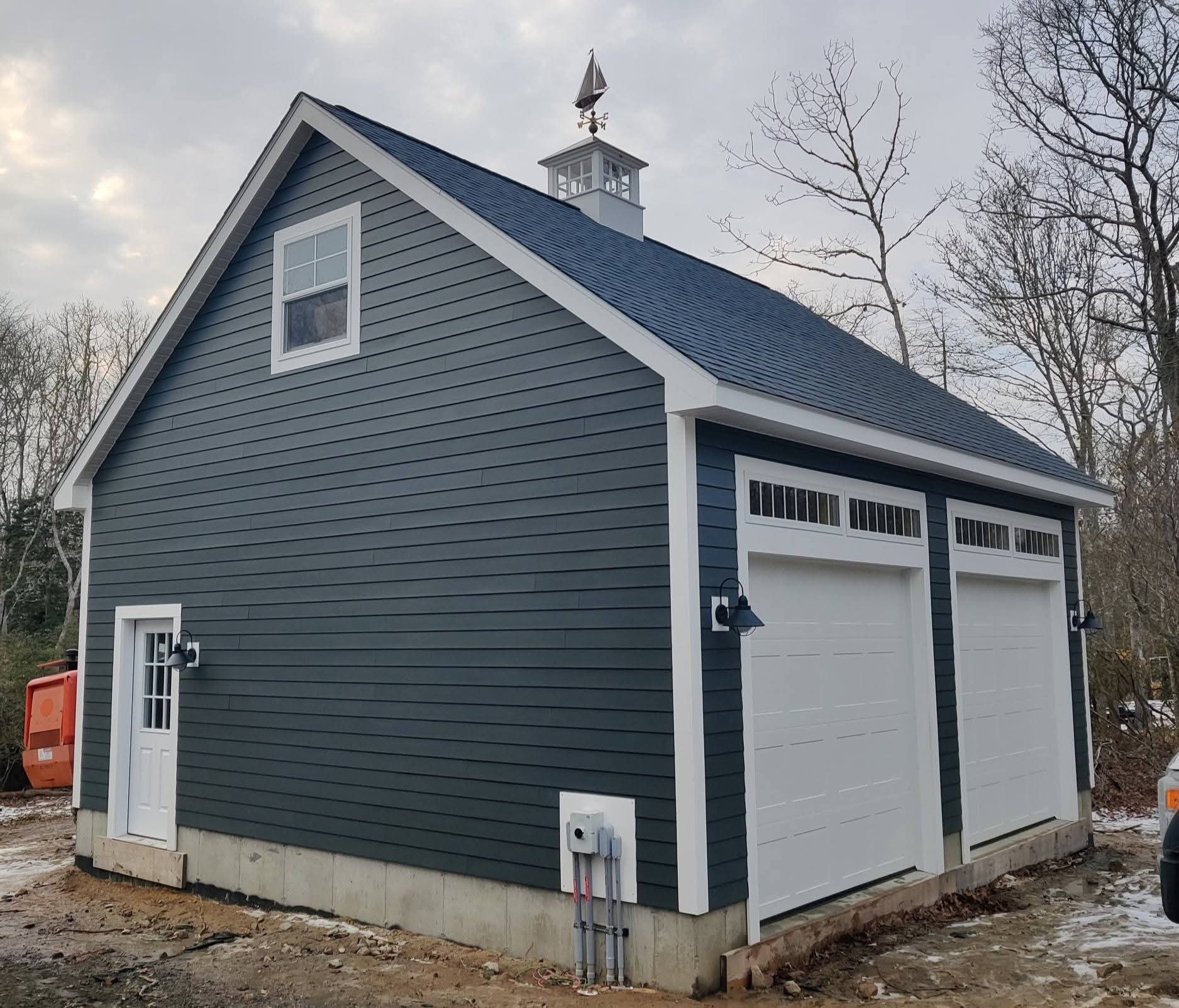 Hometown Structures 24x24 two-car garage with braced wall sections beside the doors