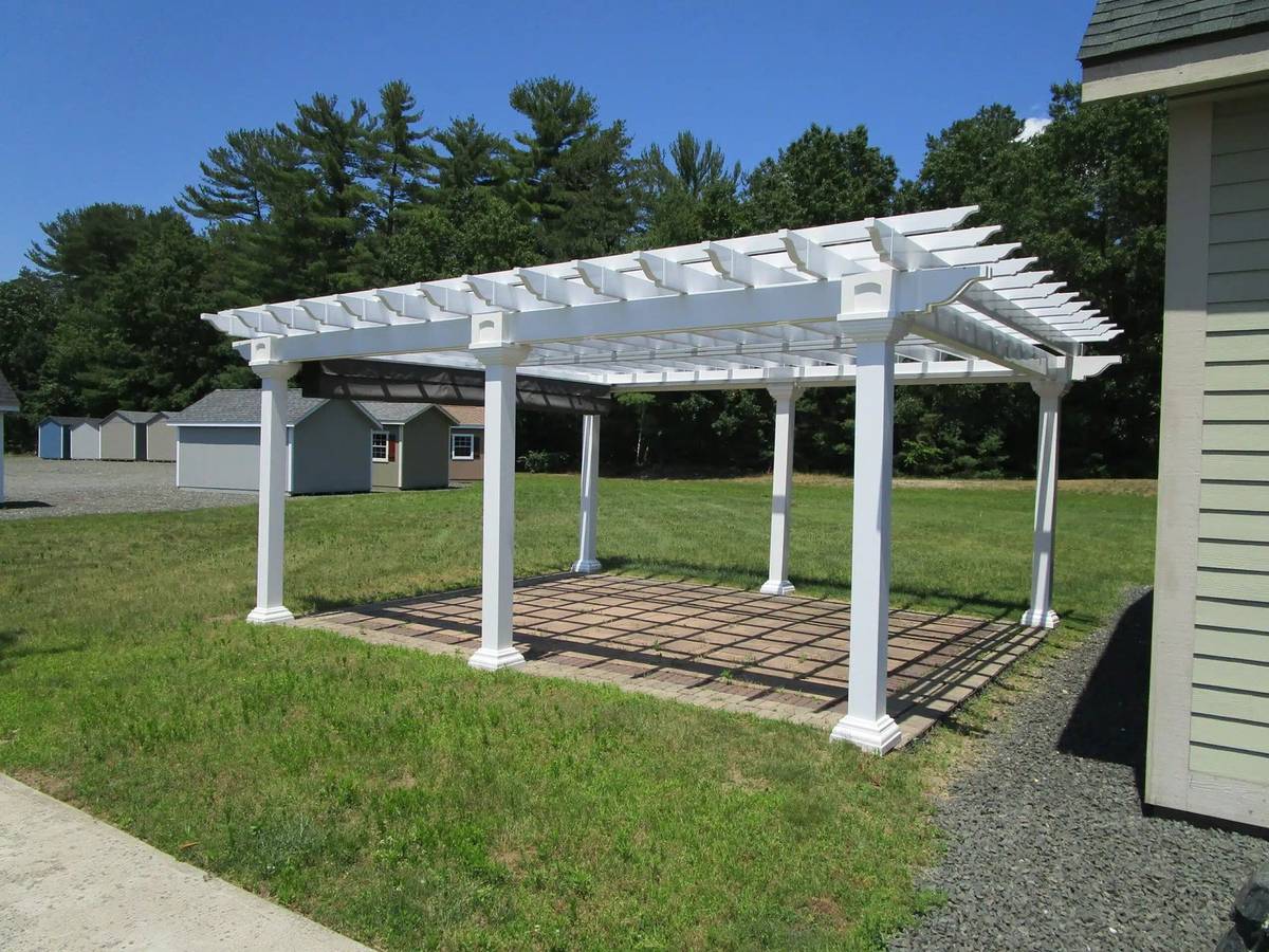Artisan Vinyl Pergola in a New England backyard