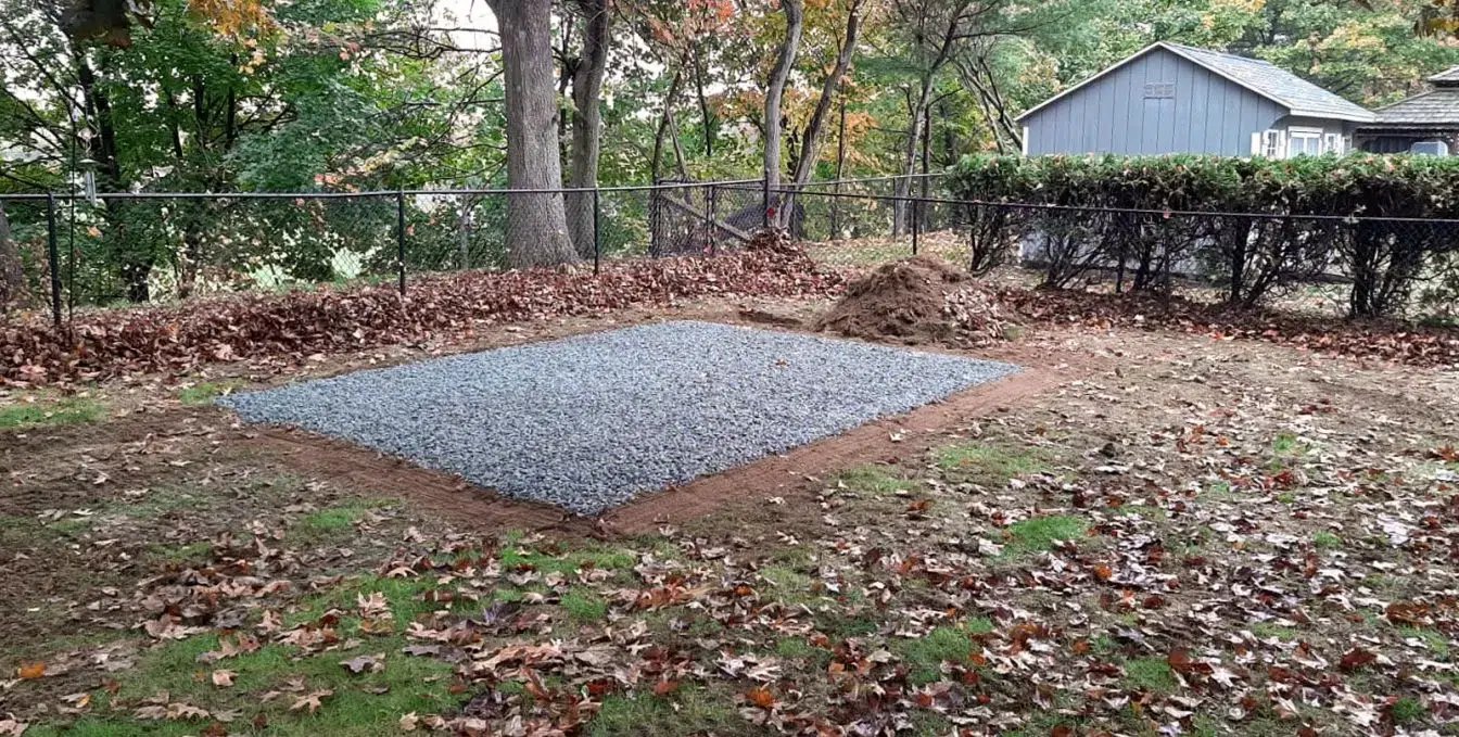 Custom storage shed on a stone pad foundation in Massachusetts