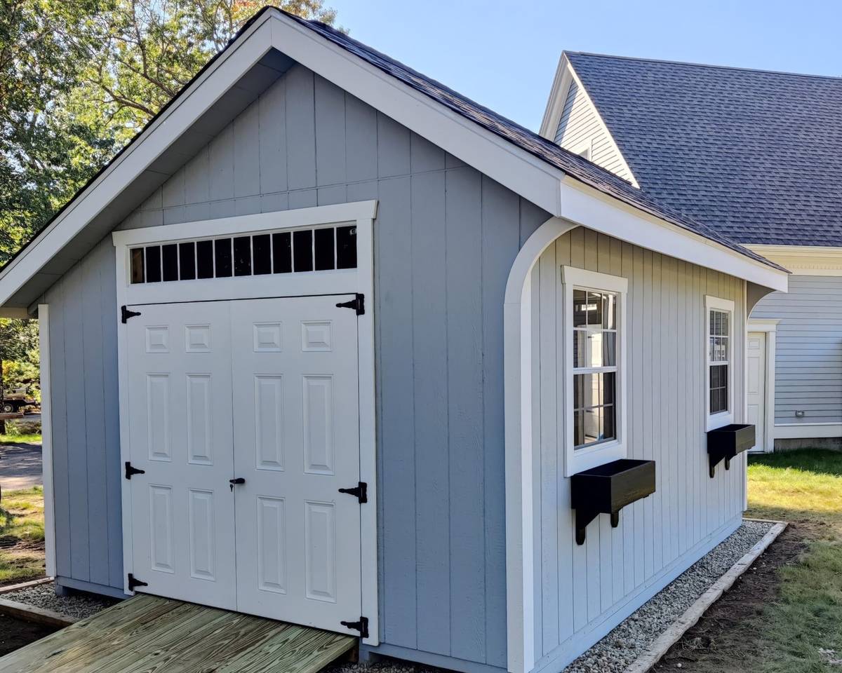 New England Quaker shed — real Hometown Structures Quaker photo, full shed